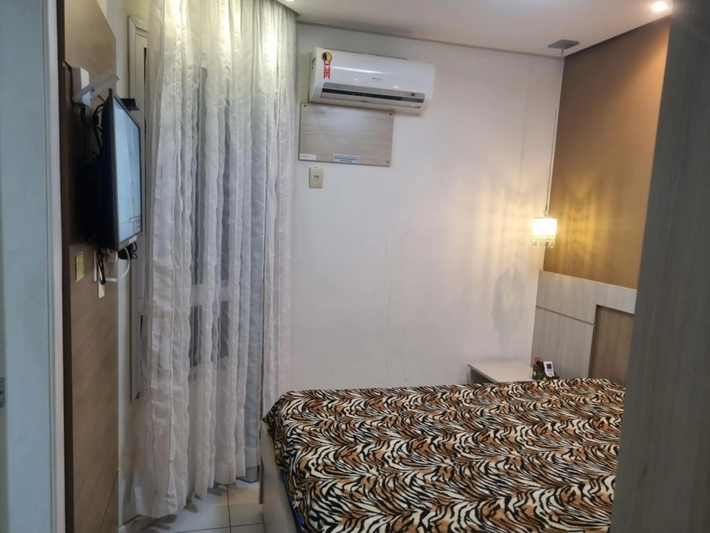 Apartamento FRENTE PARA 0 MAR - PÉ NA AREIA - 3 SUITES COM AR CONDICIONADO, 2- VAGAS DE GARAGEM - FINAMENTE DECORADO - PRAIA DO MORRO-INTERNET -WI-FI -TV COM SERVIÇOS DE DISNEY PLUS - NETFLIX -HBO MAX -STAR MAX - JOGOS AMAZON FIRE STICK - ALEXIA
