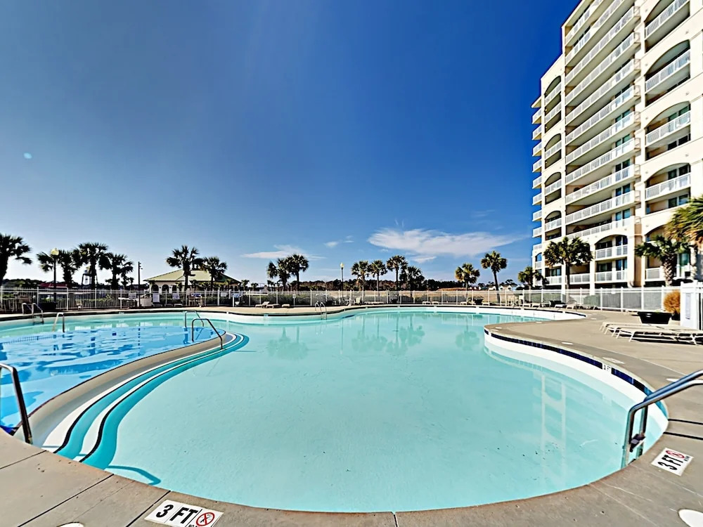 Golfers Delight: Coastal W/ Balcony & Pools 2 Bedroom Condo