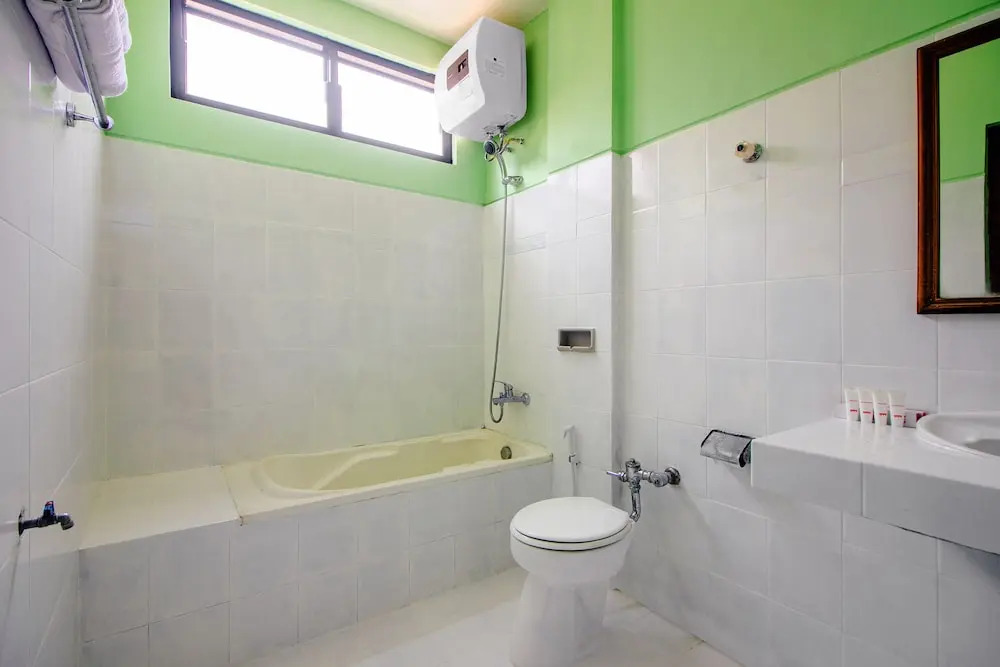 Oyo 1602 Trim Tiga Hotel