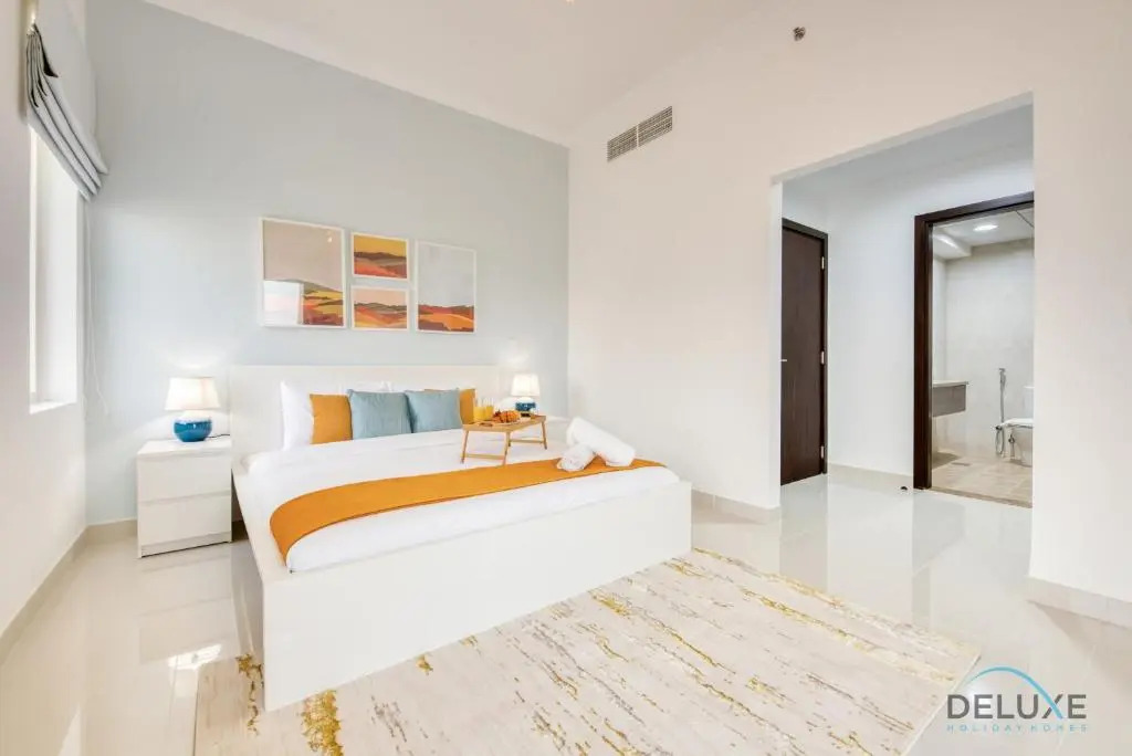 Sunny 1BR at Canal Residences West Dubai Sports City by Deluxe Holiday Homes