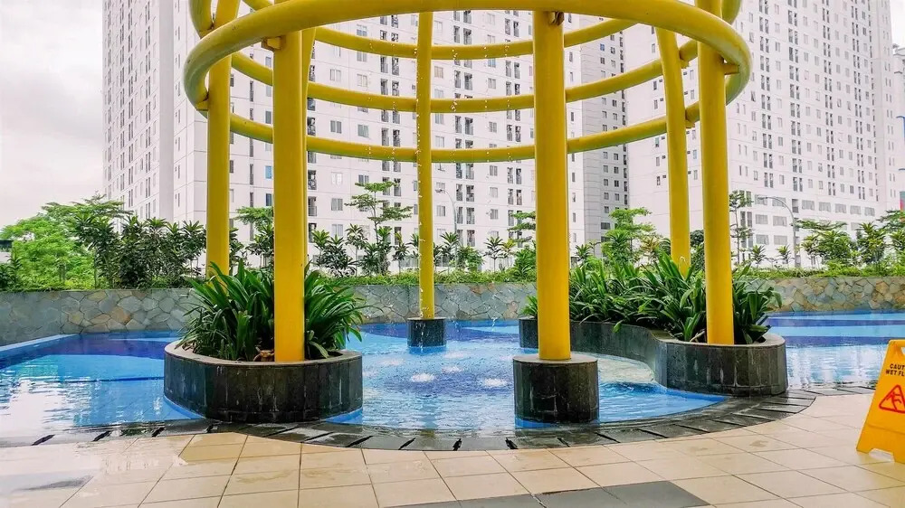 2BR Minimalist Bassura City Apartment By Travelio