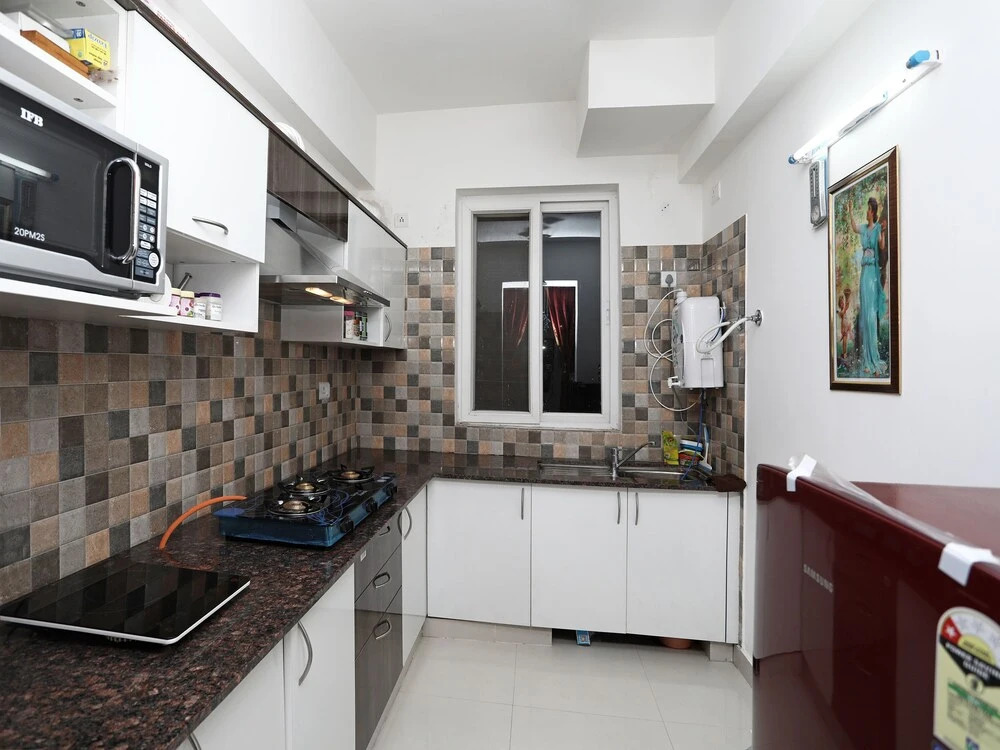OYO 13172 Home Exotic 1BHK Pacific Golf Estate