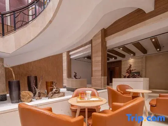 Xinzou Century Hotel (Fenghuang Plaza)