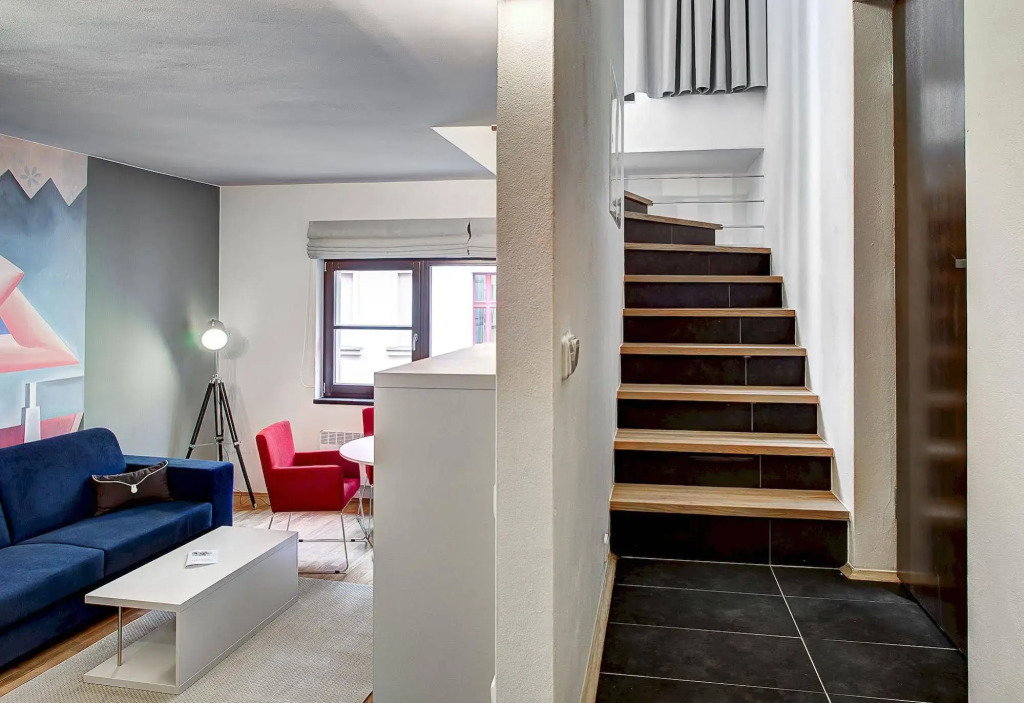 4 Arts Apartments by Adrez
