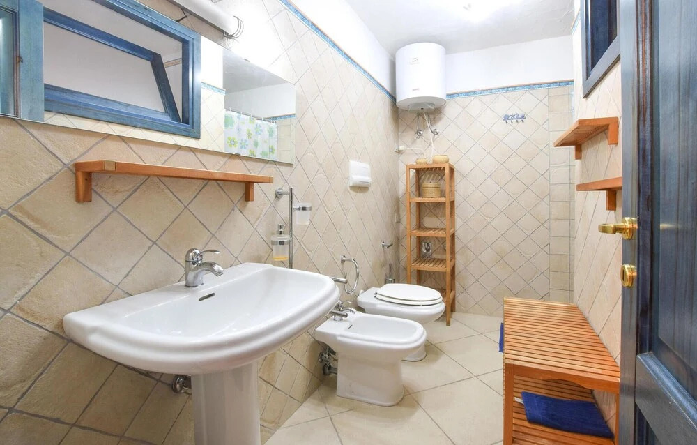 Beautiful Apartment in Monte Petrosu With Outdoor Swimming Pool and 3 Bedrooms