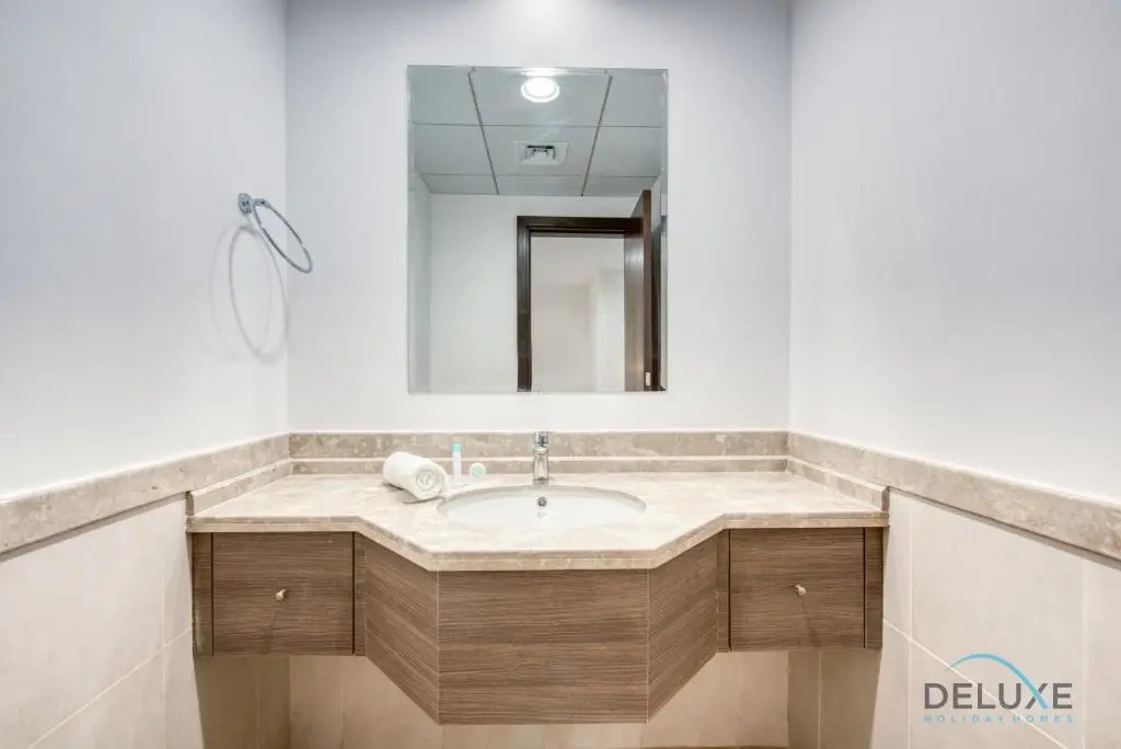 Vivid 2BR at Canal Residences West Dubai Sports City by Deluxe Holiday Homes