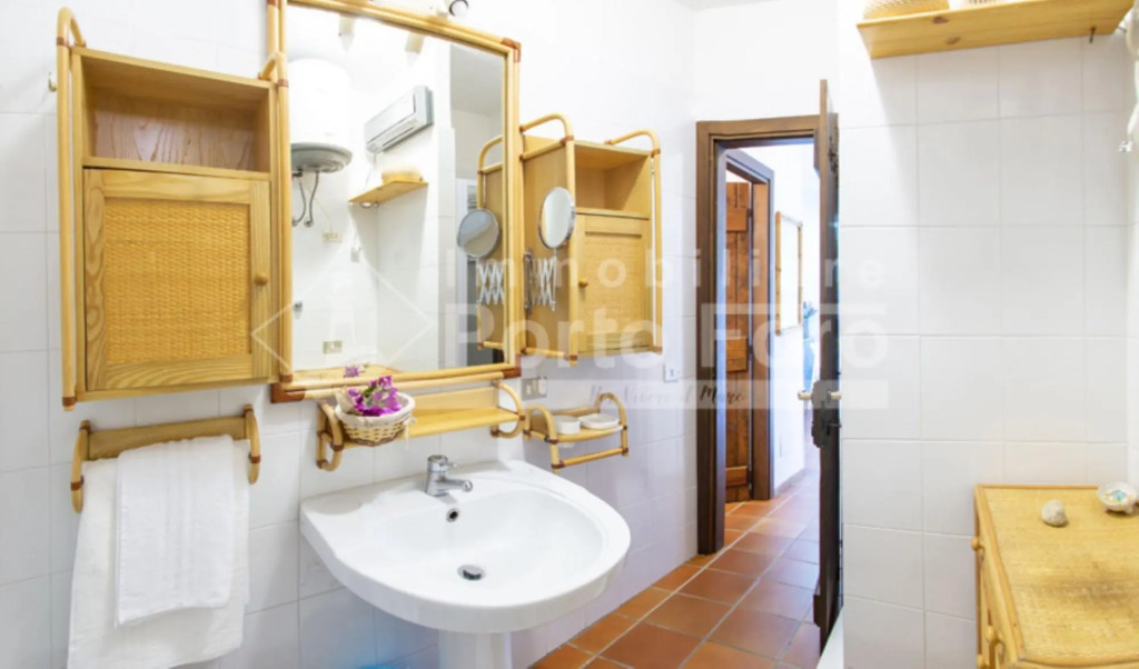 Apartment 2A - villa in the first row with sea view.-2A PORTO MANNU