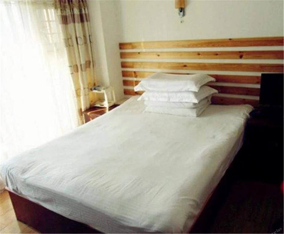 Qingdao Yike Business Hotel