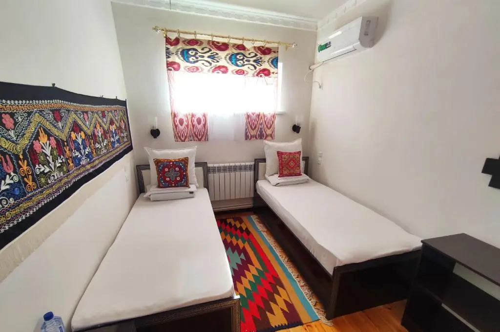 Khiva Tosh Darvoza & Trip service