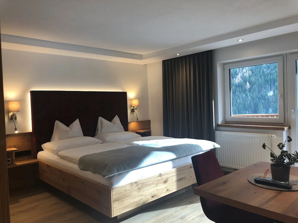 Hotel Garni Central - Zimmer - Studios - Apartments