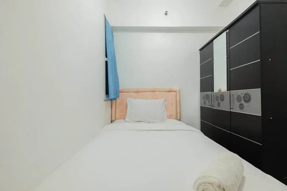 New Furnished 2BR at Mutiara Bekasi Apartment By Travelio