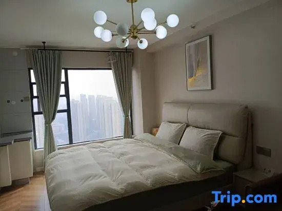 Xingcheng Homestay (Wuchang Railway Station Wushang Dream Times)