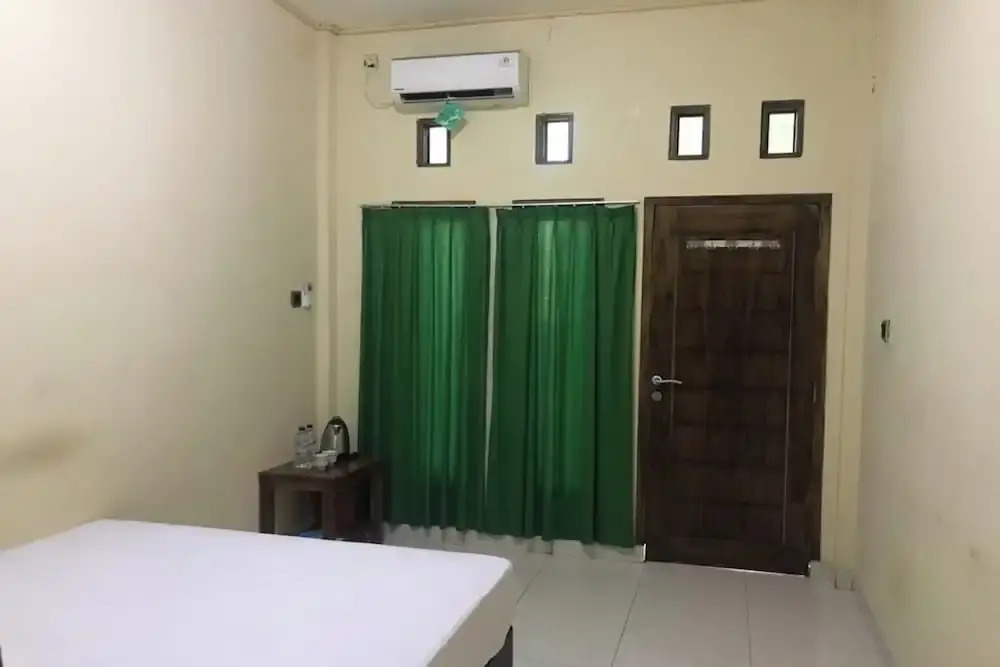 Hotel O Penginapan Mc Lodge