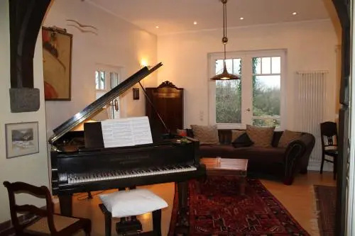 Strandvilla Hubertus Boltenhagen - Ferienwohnungen Apartment mit Parkplatz WLAN Küche Garten Grillplatz Waldbaden