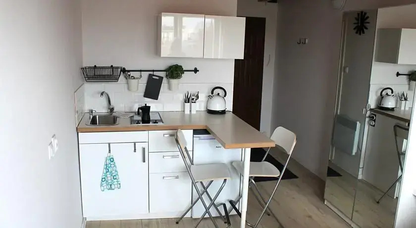Yellow Peaked Shoe Apartment
