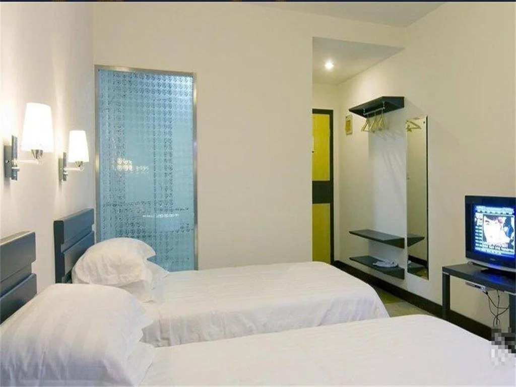 Pinghu Nine Dragon Business Hotel