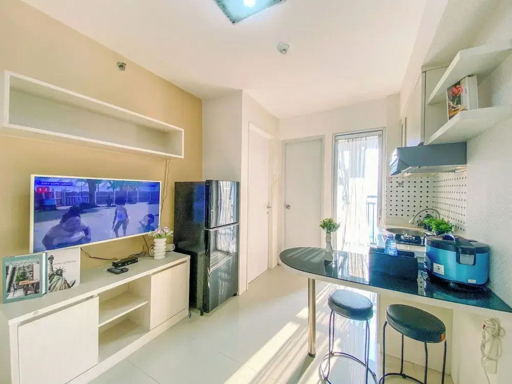 2BR with Cozy Style at Bassura City Apartment By Travelio