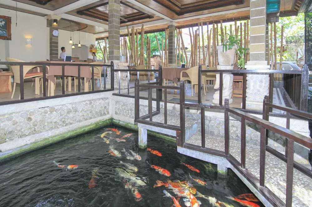 巴厘岛登巴萨艾里萨努尔德纳乌波索102酒店(Airy Sanur Danau Poso 102 Denpasar Bali)
