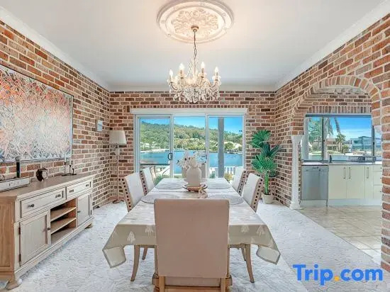 Stunning 4BR Holiday Home with Water Views & Pool