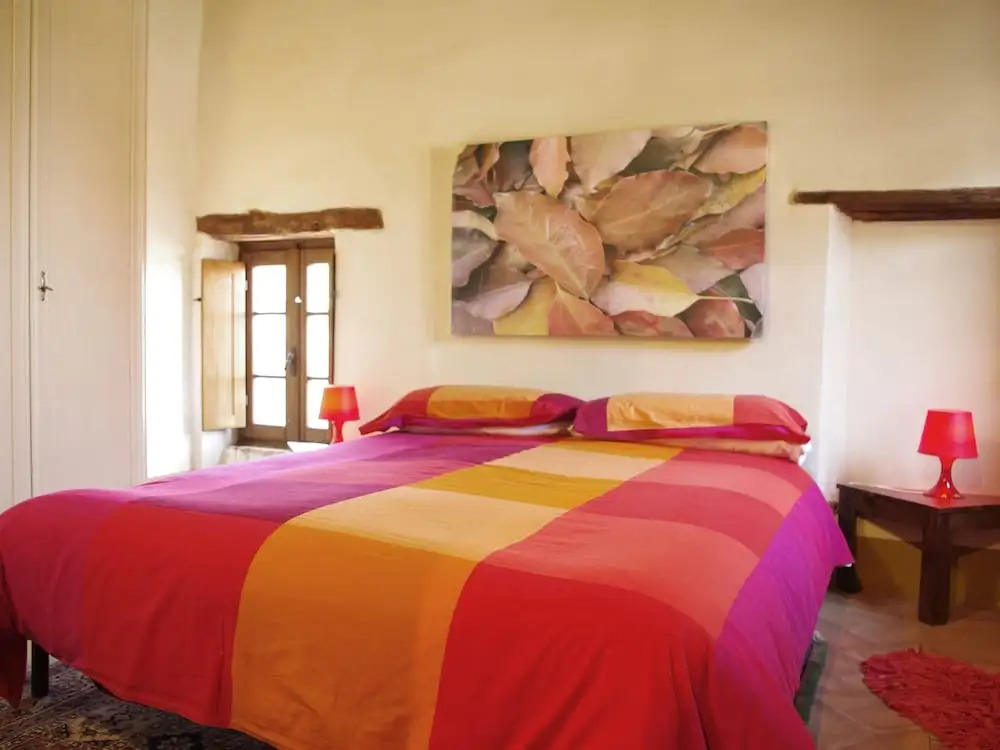 In a wonderful medieval village on the Tuscan hills, with air conditioning