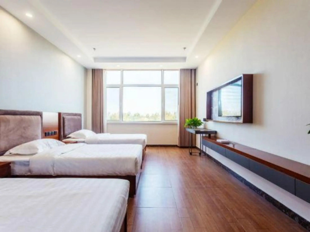 99 Xinbiao Hotel (Binzhou Yangxin Bus Station Lubei Street)