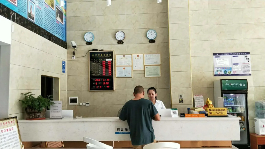 Q+ Nanxiong Xinhewan Business Hotel