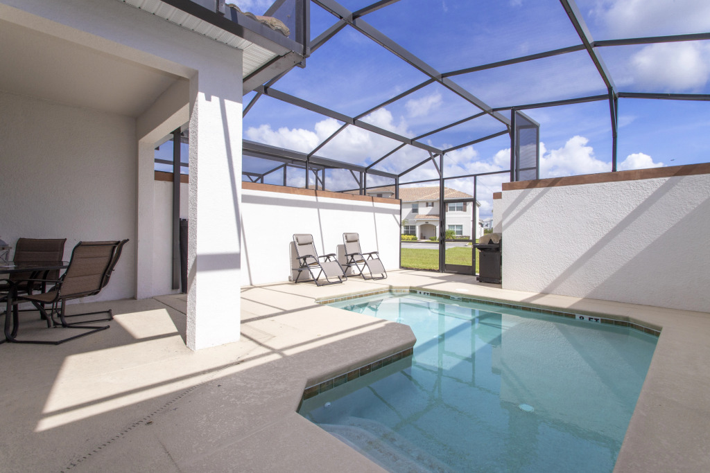 Stunning Four Bedroom w Screened Pool Close to Disney 1559