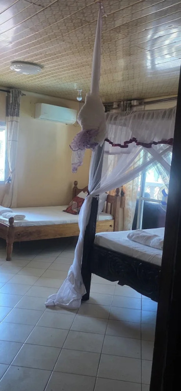 Luxurious 4-bedroom Holiday House With Pool Access in Diani Beach