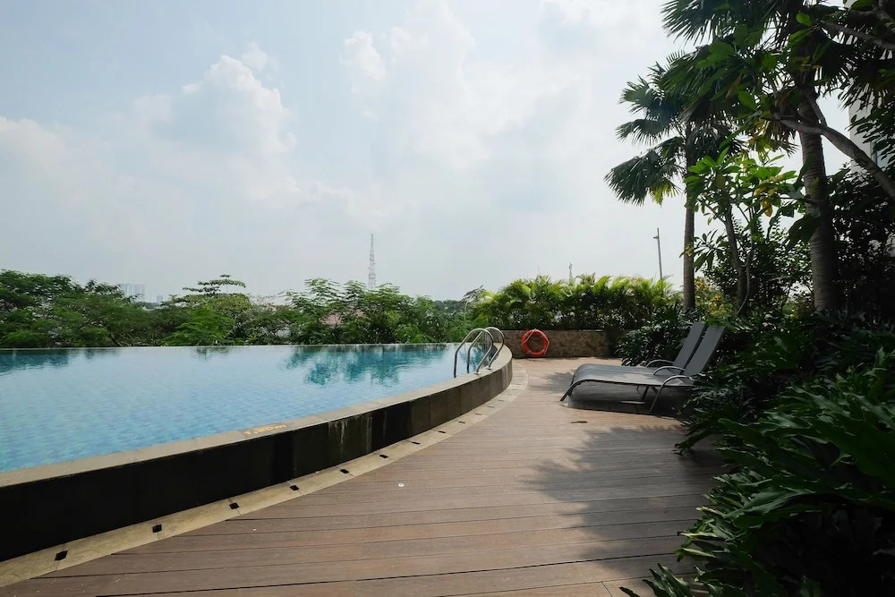 Tidy and Homey Studio Apartment at Mustika Golf Residence By Travelio