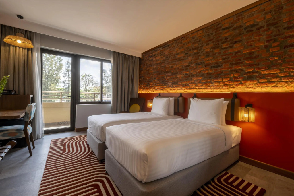 Zaria Court Kigali, Tapestry Collection by Hilton
