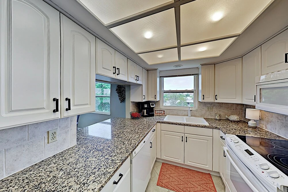 New Listing! Waterfront W/ Pool & Dock 2 Bedroom Condo