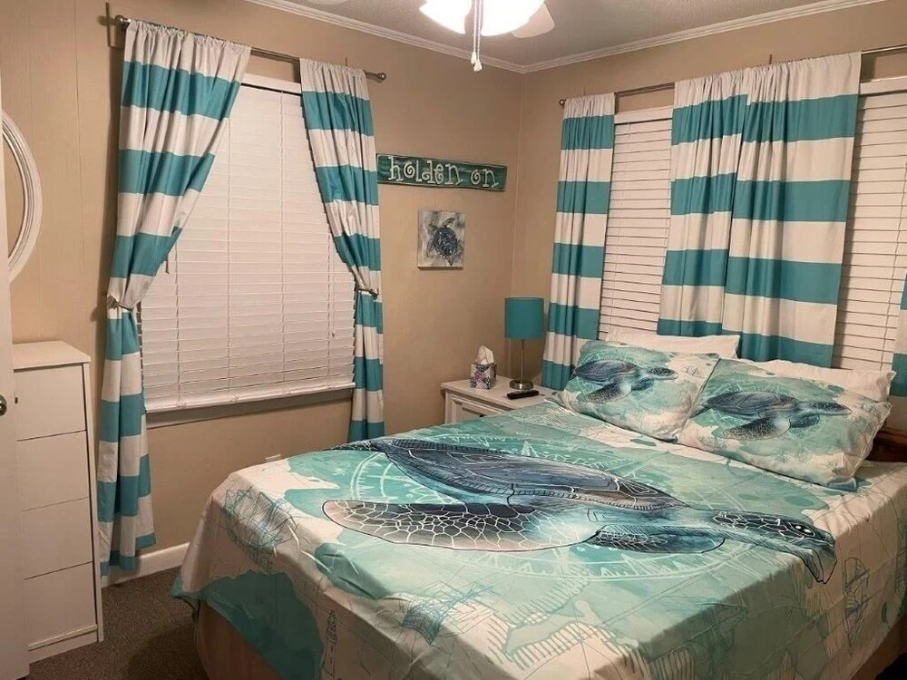 Sandy Bottoms 4 Bedroom Home by RedAwning