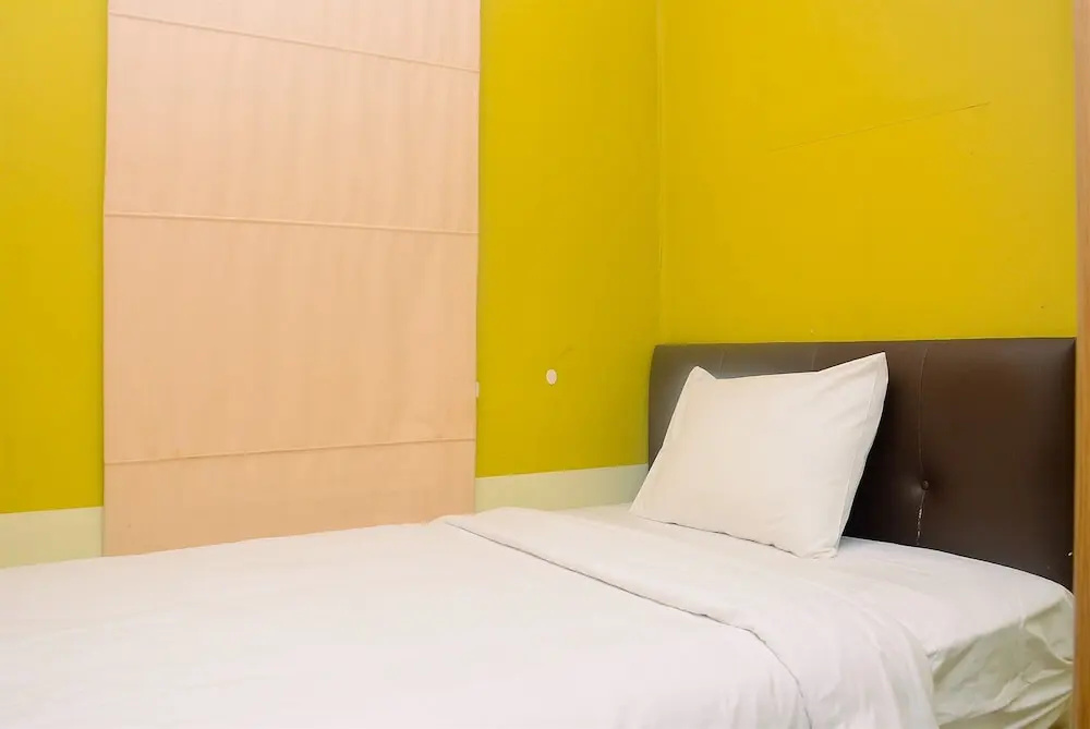 Beautiful 2BR with Direct Access to Pool Green Bay Pluit Apartment By Travelio
