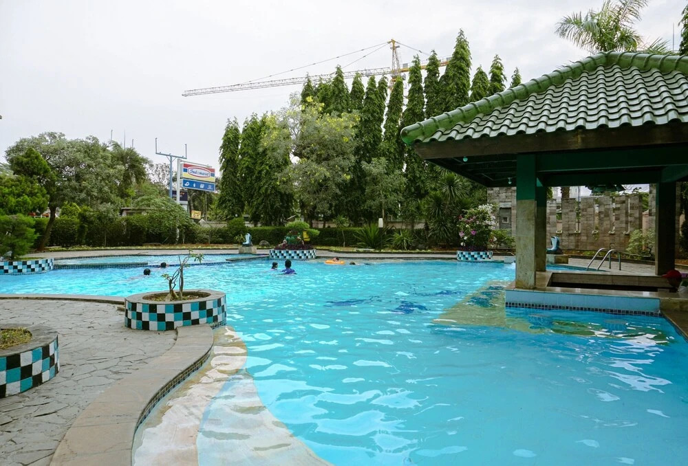 Clean and Homey 1BR at Puri Garden Apartment