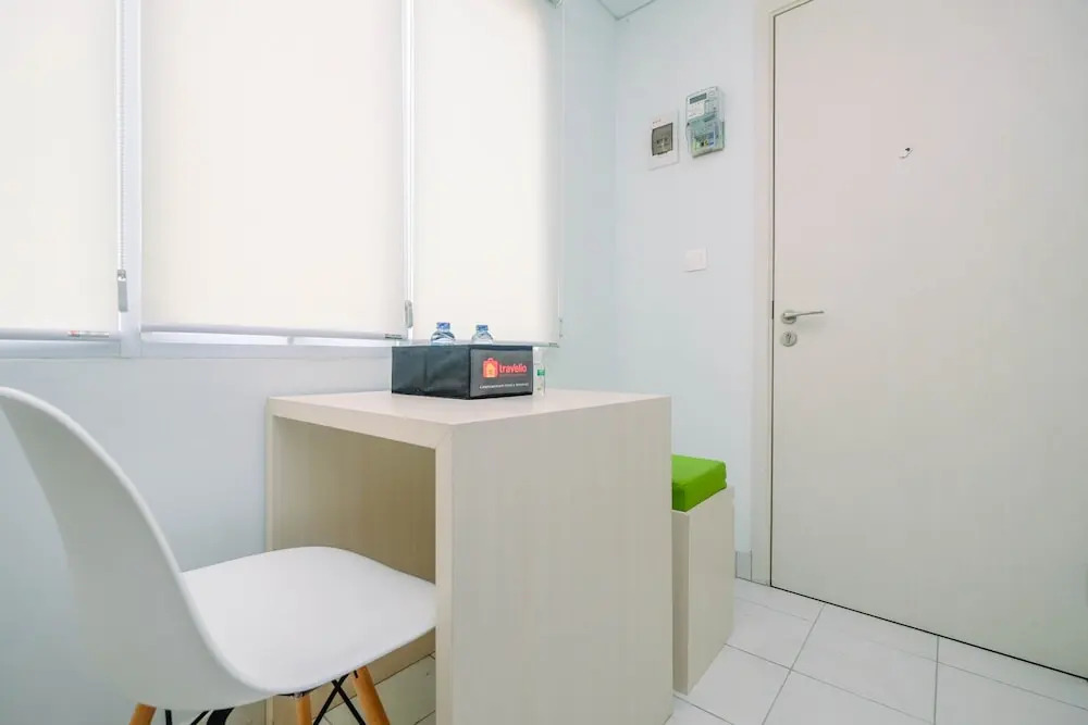 Minimalist and Cozy 1BR Patraland Urbano Apartment By Travelio