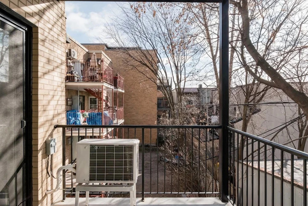 Discover Little Italy From a Bright Apartment