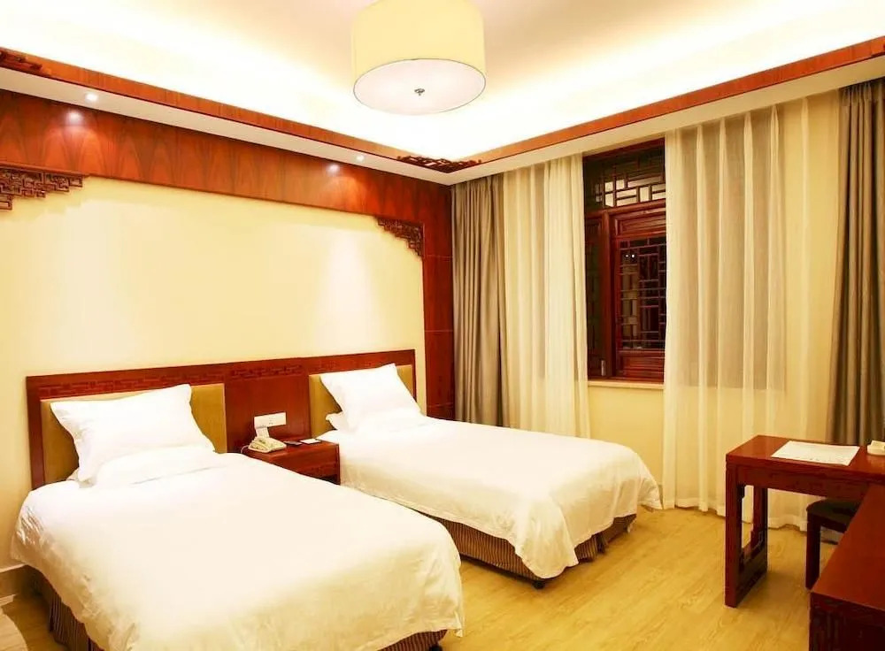 By The Peach Blossom Pool Holiday Hotel