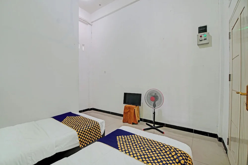 Hotel O Penginapan Puti SyariahNearBandara Sultan Syarif Kasim II