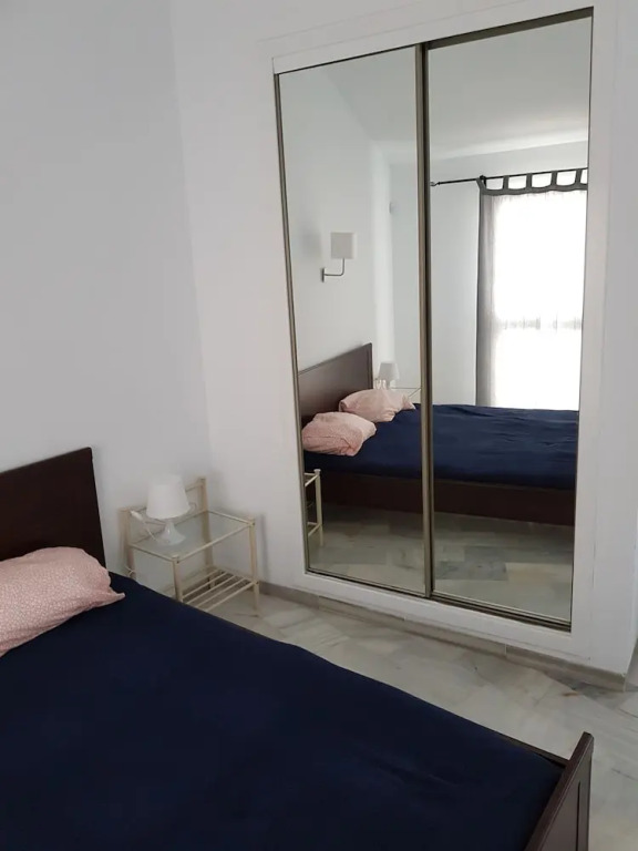Sunny and spacious apartment with own entrance to pool
