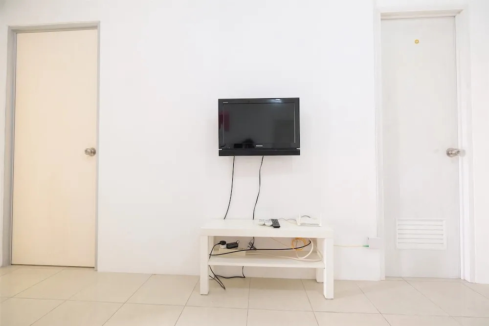 Green Bay Pluit Apartment with Sofa Bed
