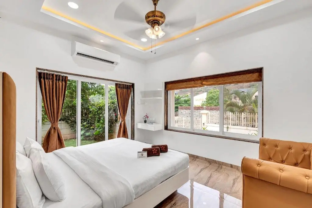SaffronStays Juniper, Lonavala - Pet-friendly villa with pool, lawn, gym & games