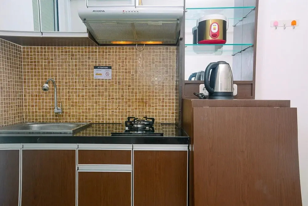 Comfort and Minimalist Studio Bassura City Apartment by Travelio