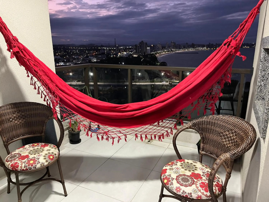 Apartamento novo frente mar com piscina aquecida em Home Club