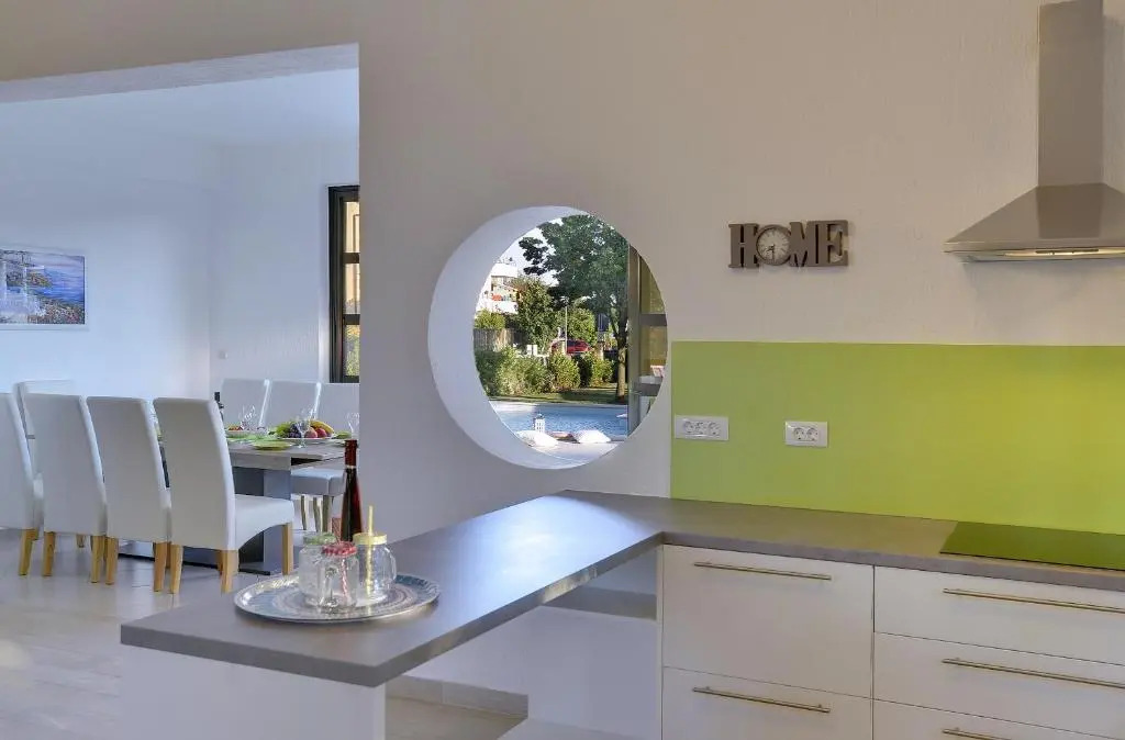Villa Andrija Family Dream with heated pool at the sea with beautiful garden, outside cinema and kids playground