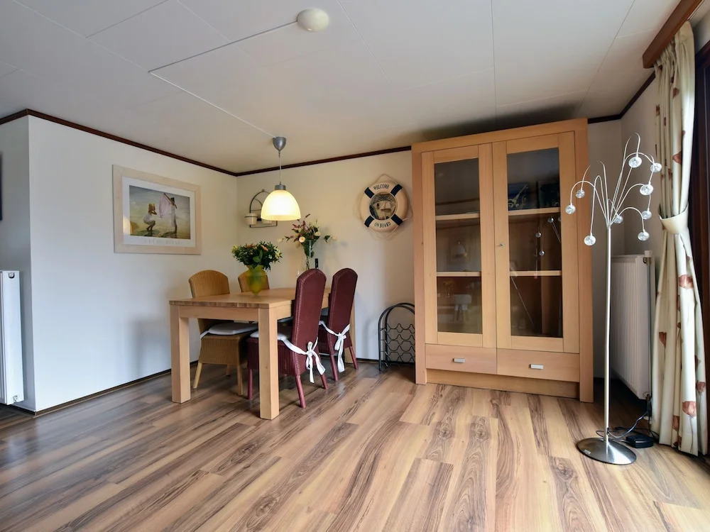Chalet in Holiday Park With Spacious Living Room, Large Enclosed Garden and Unobstructed View