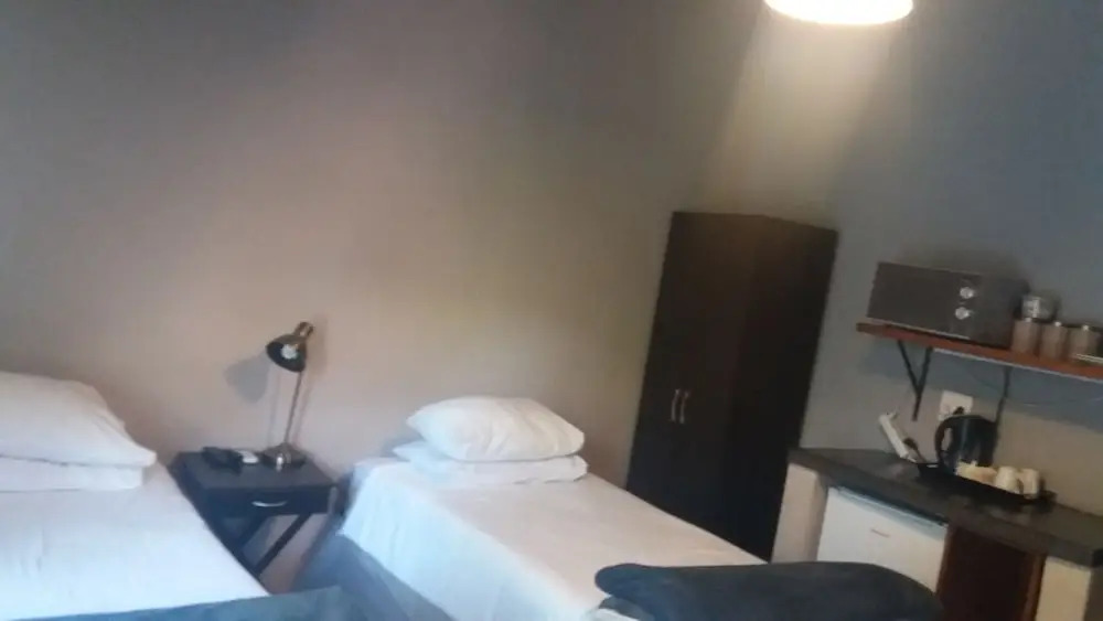 Comfy room with dstv and aircon in convenient location