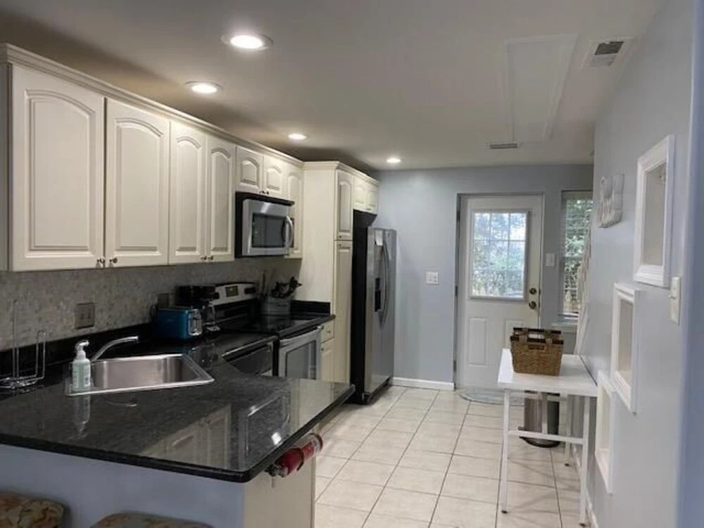 Carriage House #64613 4 Bedrooms 3 Bathrooms Home