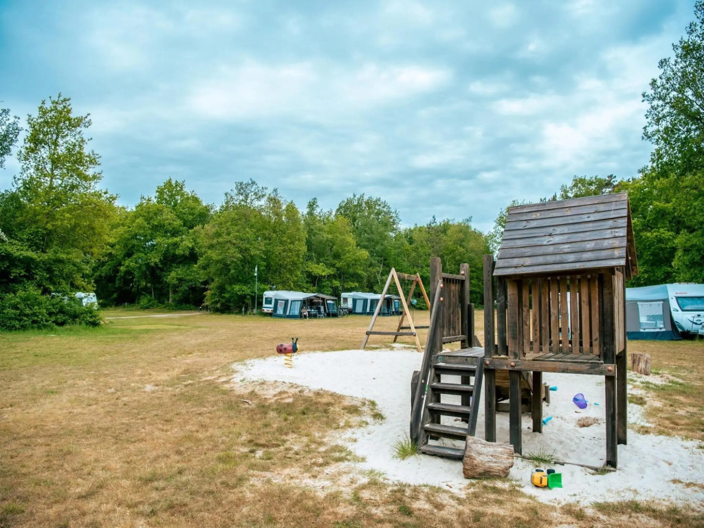 Wooden chalet with microwave, on a holiday park near three national parks