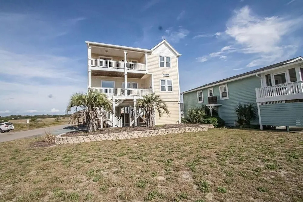 Sun Kissed 5 Bedroom Home by RedAwning