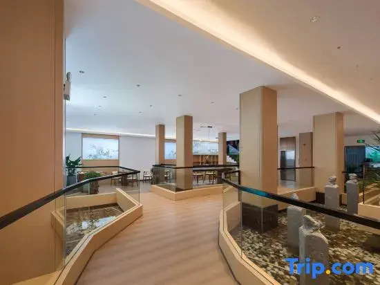 Zhangjiajie Huan Sha Ju Hotel一Newly opened in 2026 一robot service一coffee bar 一24 hour ice supply一free washing machine and dryer 一close to East Gate Ticket Office一Baofeng Lake一Huanglong Cave Scenic Area